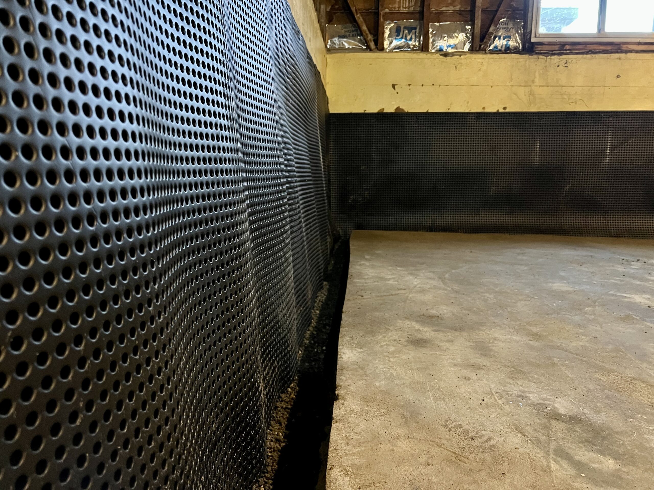 membrane installed for a interior basement waterproofing in Bellevue, WA